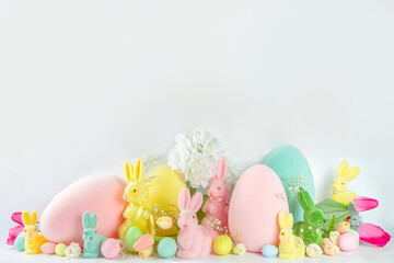 Easter bunnies and eggs wide background