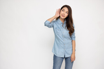 Asian woman listening to something by putting hand on the ear isolated on white background