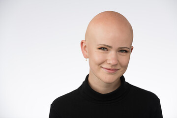 Young urban woman with blue eyes and a fair complexion poses for the camera.