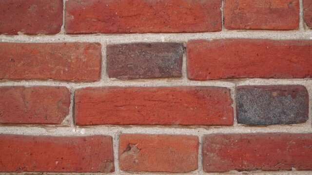 beautiful handmade red brick wall. Background. Antique brick