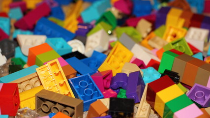 A many colorful blocks from the children's construction model kit, a texture for the background