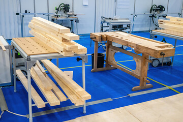 Woodworking workshop. Workshop for manufacture of wood furniture. Modern furniture production without people. Carpenter's workshop with many modern machines. Woodworking production.