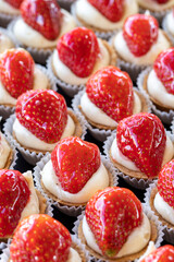 Strawberry petits fours or tartlets. Close up