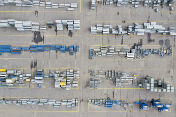 Industrial zone from above. Aerial view of storage place. Construction materials. Steel materials. Top view.