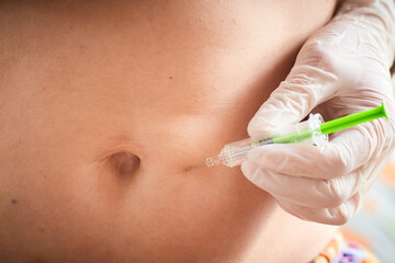 Injection near the navel with anticoagulant -  Pregnant women with Trombophilia have to inject...