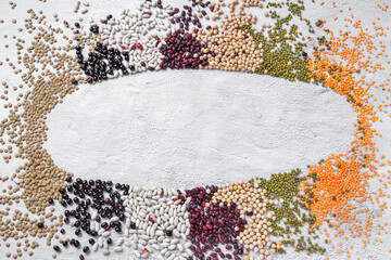 Legumes white copy space concrete background. Different dry bean for eating healthy. Vegan food concept.
