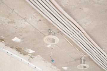 Fototapeta premium Installation of electrical equipment in a new apartment.Repair of electrical equipment.