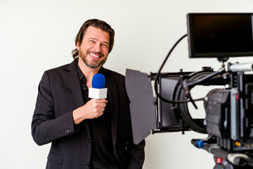 Middle age reporter man with a microhpone