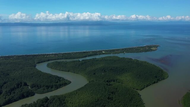 Punta Zancudo peninsula aerial shot sunny day Costa Rica pacific ocean Golfe Dulce