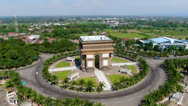 Iconic Simpang Lima Gumul Monument in Kediri Indonesia, aerial view in sunny day