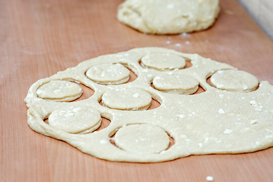 Traditional pastries. Homemade donuts. Photo 3: cookies were cut out of the dough.