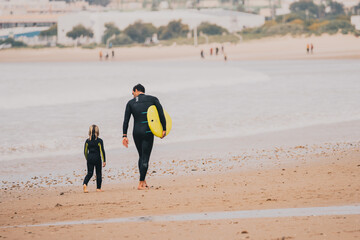 Father and son after surfing
