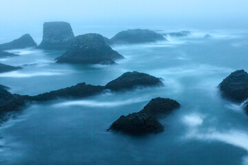 Stormy coastal landscape of Arnarstapi at night