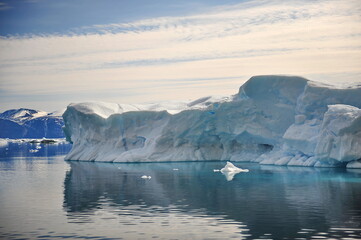 Fototapeta na wymiar Greenland. Icebergs in Disco Bay. Landscapes of polar nature.