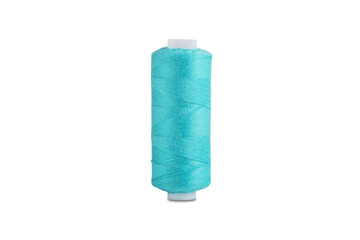 Sewing thread and bobbin in blue  color on isolated white  background
