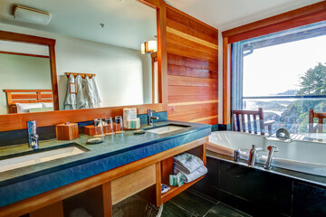 Tofino, British Columbia - March 8, 2018: The bathroom of a guest room at the Wickaninnish Hotel in Tofino British Columbia