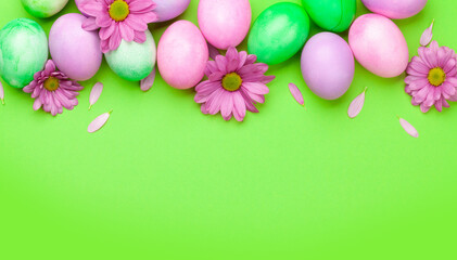 Easter greeting card with colorful easter eggs and flowers