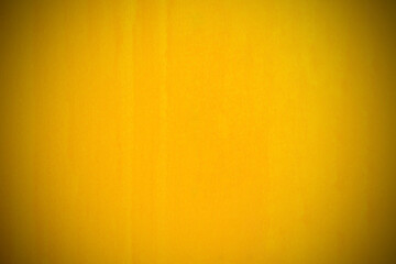 Closeup on Old yellow walls for the background. Yellow background adjusts vignetting. The yellow stains on the walls. yellow cement layout design for warm colorful background.