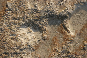 Texture of travertine in Pamukkale, Turkey. Natural geological formation background.