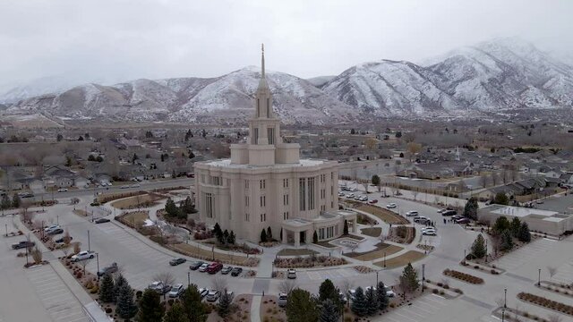 LDS Mormon Payson Temple on Cloudy, Snowy Day in Utah - Aerial