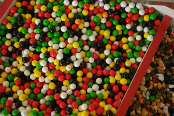 Fototapeta na wymiar Multicolored candies background. Delicious candy balls close up. Food concept.
