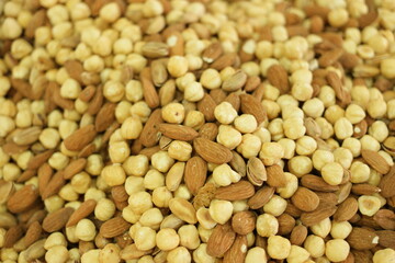 Mixed nuts background. Assorted nuts close up. Healthy snack concept.