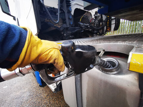 Semi Truck Being Refuelled with Diesel Close up
