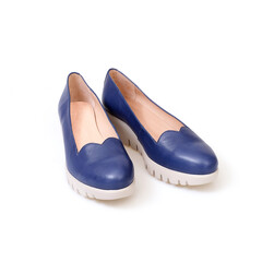 Comfortable beautiful blue shoes isolated on white background