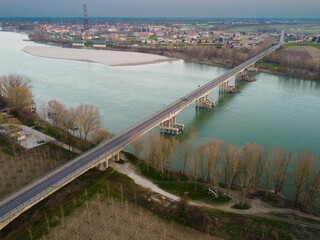 aerial view of the viadana Boretto bridge over the po river, italy