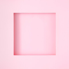 Creative pastel pink frame with negative space and shadows. Minimal copy space concept. Flat lay.