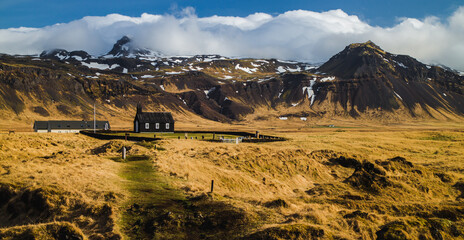 Panorama view of Snæfellsnes, Budir church and snowy mountains in the background