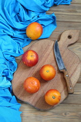 tangerines on a wooden table