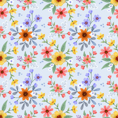 Colorful flowers on a light blue color seamless pattern for fabric textile background.