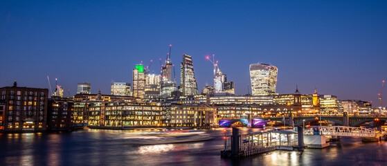 London, England-Panoramic view of the skyline of the Bank and Canary Wharf, London's leading...