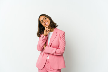 Fototapeta premium Young latin business woman isolated on white background showing strength gesture with arms, symbol of feminine power