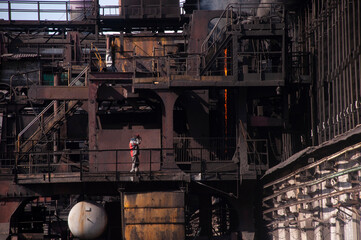 the coke pusher pushes the coke. Coke oven battery. coke and chemicals plant/