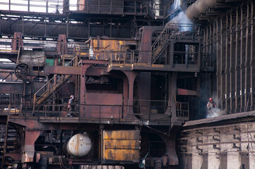 the coke pusher pushes the coke. Coke oven battery. coke and chemicals plant/