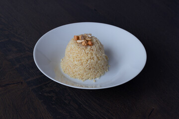 Bulgur tower on a white plate