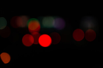 Bright round lights on black background