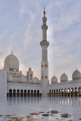 Fototapeta na wymiar Sheikh Zayed Mosque against the sunset sky. Inside view