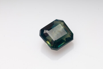 Natural stone sapphire on a white background