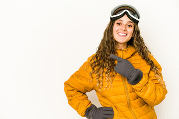 Young caucasian snowboarder woman isolated smiling and pointing aside, showing something at blank space.