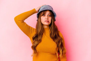 Naklejka premium Young caucasian woman wearing fishermans hat isolated being shocked, she has remembered important meeting.