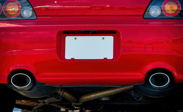 Blank White License Plate On Red Car Bumper REVISED