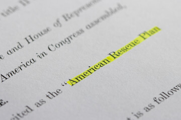 Closeup of the documents of the American Rescue Plan Act of 2021, an economic stimulus package...