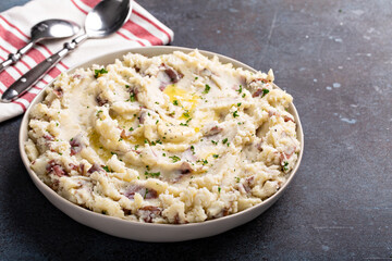 Traditional southern garlic mashed potatoes made with red potatoes skin on