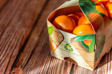 Fresh and organic mandarins or tangerines in recyclable packaging