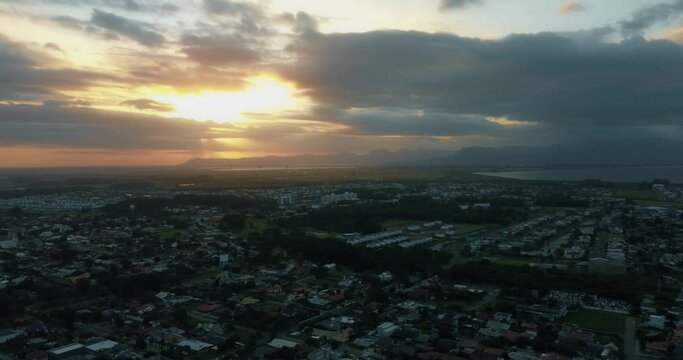 Cap&atilde;o da canoa beach at sunset summer bildings houses drone eolic