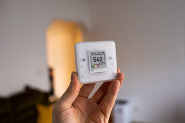 CO₂ sensor monitor. Indoor air quality sensor. Healthy work environment. Work control proper...