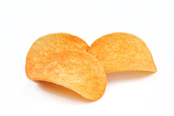 Three slices of paprika chips isolated on white background. Junk food